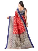 Woman wearing a red party wear ethnic kurta style by Nishtha Chadda