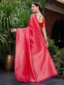 Woman wearing a red party wear ethnic kurta style by Nishtha Chadda