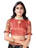 Woman wearing a red party wear ethnic kurta style by Nishtha Chadda