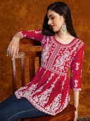 Woman wearing a brown party wear ethnic kurta style by Nishtha Chadda
