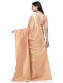 Woman wearing a beige party wear ethnic kurta style by Nishtha Chadda