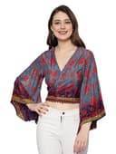 Woman wearing a brown party wear ethnic kurta style by Nishtha Chadda