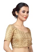 Woman wearing a grey party wear ethnic kurta style by Nishtha Chadda