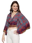 Woman wearing a brown party wear ethnic kurta style by Nishtha Chadda