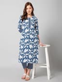 Woman wearing a grey party wear ethnic kurta style by Nishtha Chadda