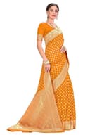 Woman wearing a orange party wear ethnic kurta style by Nishtha Chadda