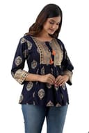 Woman wearing a brown party wear ethnic kurta style by Nishtha Chadda