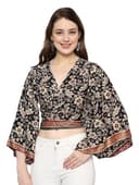 Woman wearing a grey party wear ethnic kurta style by Nishtha Chadda