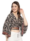 Woman wearing a grey party wear ethnic kurta style by Nishtha Chadda