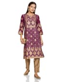 Woman wearing a brown party wear ethnic kurta style by Nishtha Chadda