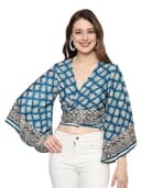Woman wearing a teal party wear ethnic kurta style by Nishtha Chadda