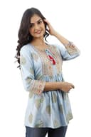 Woman wearing a grey party wear ethnic kurta style by Nishtha Chadda