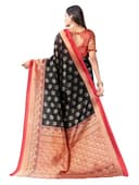 Woman wearing a coral party wear ethnic kurta style by Nishtha Chadda