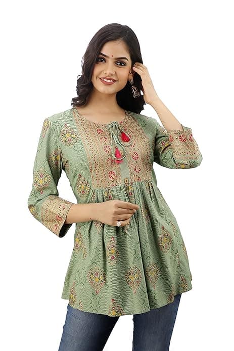Woman wearing a grey party wear ethnic kurta style by Nishtha Chadda