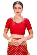 Woman wearing a red party wear ethnic kurta style by Nishtha Chadda
