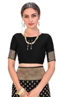 Woman wearing a beige party wear ethnic kurta style by Nishtha Chadda