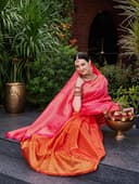 Woman wearing a red party wear ethnic kurta style by Nishtha Chadda