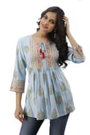 Woman wearing a grey party wear ethnic kurta style by Nishtha Chadda