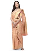 Woman wearing a coral party wear ethnic kurta style by Nishtha Chadda