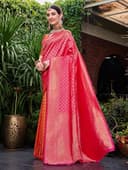 Woman wearing a red party wear ethnic kurta style by Nishtha Chadda