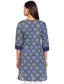 Woman wearing a grey party wear ethnic kurta style by Nishtha Chadda