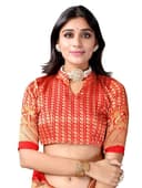 Woman wearing a red party wear ethnic kurta style by Nishtha Chadda