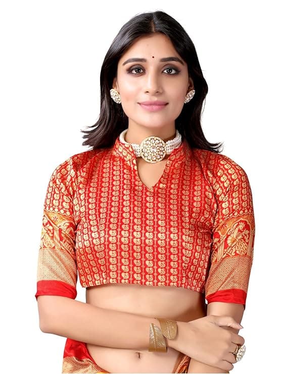 Woman wearing a red party wear ethnic kurta style by Nishtha Chadda