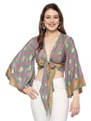 Woman wearing a grey party wear ethnic kurta style by Nishtha Chadda