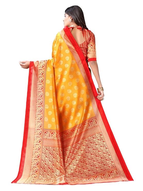 Woman wearing a orange party wear ethnic kurta style by Nishtha Chadda