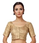 Woman wearing a grey party wear ethnic kurta style by Nishtha Chadda