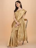 Woman wearing a brown party wear ethnic kurta style by Nishtha Chadda