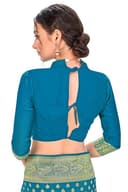 Woman wearing a teal party wear ethnic kurta style by Nishtha Chadda