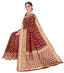 Woman wearing a maroon party wear ethnic kurta style by Nishtha Chadda