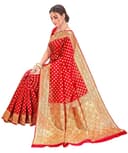 Woman wearing a red party wear ethnic kurta style by Nishtha Chadda