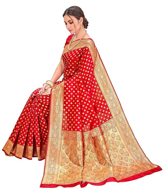 Woman wearing a red party wear ethnic kurta style by Nishtha Chadda