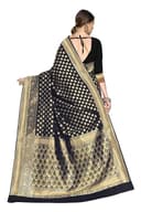 Woman wearing a beige party wear ethnic kurta style by Nishtha Chadda