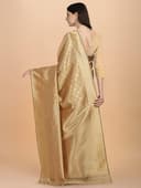 Woman wearing a brown party wear ethnic kurta style by Nishtha Chadda