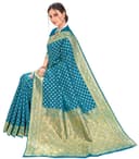 Woman wearing a teal party wear ethnic kurta style by Nishtha Chadda