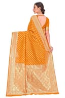 Woman wearing a orange party wear ethnic kurta style by Nishtha Chadda