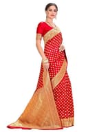 Woman wearing a red party wear ethnic kurta style by Nishtha Chadda