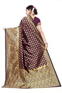 Woman wearing a brown party wear ethnic kurta style by Nishtha Chadda