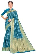 Woman wearing a teal party wear ethnic kurta style by Nishtha Chadda