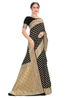 Woman wearing a beige party wear ethnic kurta style by Nishtha Chadda