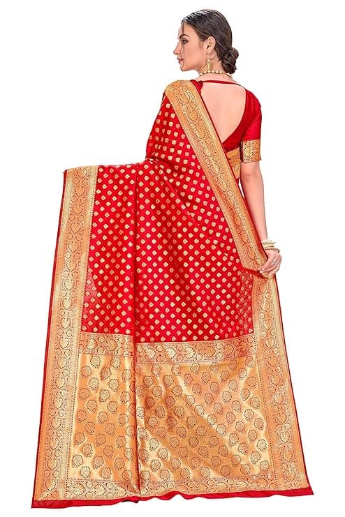 Woman wearing a red party wear ethnic kurta style by Nishtha Chadda