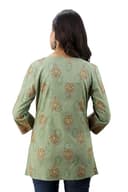 Woman wearing a olive party wear ethnic kurta style by Nishtha Chadda