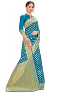 Woman wearing a teal party wear ethnic kurta style by Nishtha Chadda