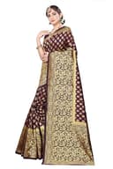 Woman wearing a brown party wear ethnic kurta style by Nishtha Chadda
