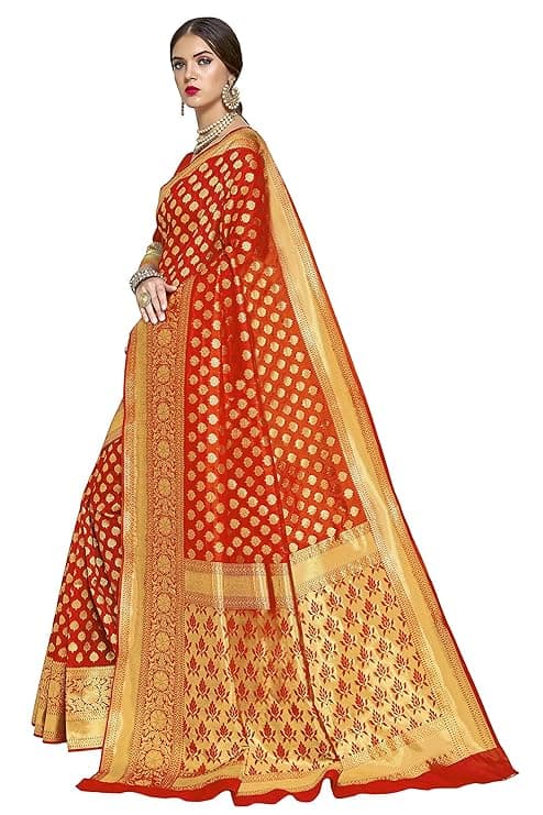 Woman wearing a red party wear ethnic kurta style by Nishtha Chadda
