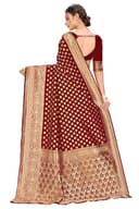 Woman wearing a maroon party wear ethnic kurta style by Nishtha Chadda