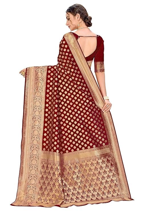 Woman wearing a maroon party wear ethnic kurta style by Nishtha Chadda